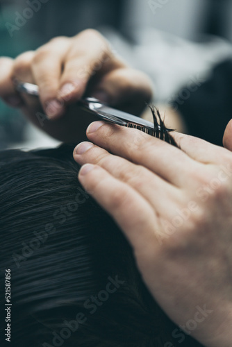 Barbershop haircut styling with dangerous blade