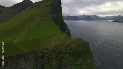 Kallur Lighthouse on Kalsoy in the Faroe Islands by Drone photo