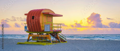 Lifeguard hut on the beach in Miami Florida, colorful hut on the beach during sunrise Miami South Beach. Sunny day on the beach © Fokke Baarssen