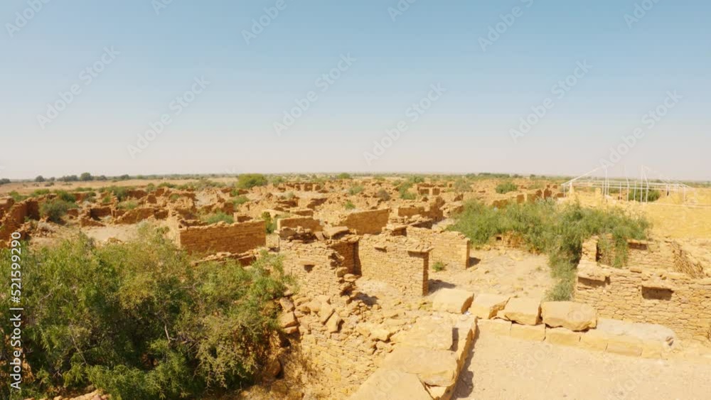 4K shot of the abandoned Kuldhara village near Jaisalmer, Rajasthan, India. Panning shot of old ruins of haunted Kuldhara village. Ruins of old village of old civilization. 4K shot of the abandoned Kuldhara village near Jaisalmer, Rajasthan, India. Panning shot of old ruins of haunted Kuldhara village. Ruins of old village of old civilization.