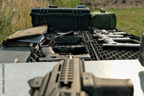 military weapon lies on the table. pistol . weapons at the shooting range