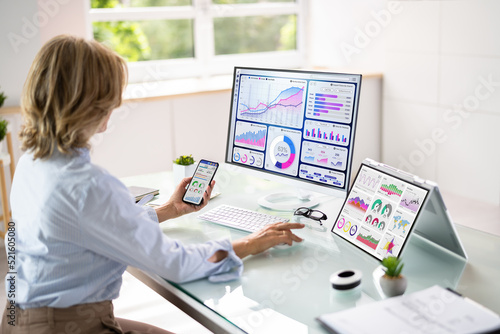Business Data Analyst Woman Using KPI Tech © Andrey Popov