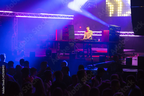 Dj playing techno music on the live night concert in summer © Solid photos