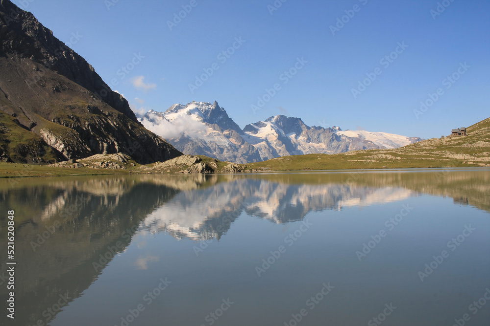 Goleon lake in the french Alps with view on La Meije mountain 
