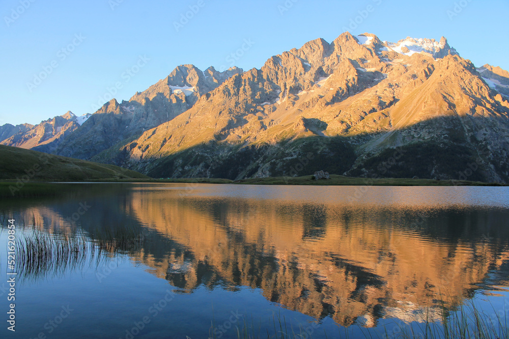 Pontet lake in the french Alps with view on Ecrins mountains Pontet lake in the french Alps with view on Ecrins mountains