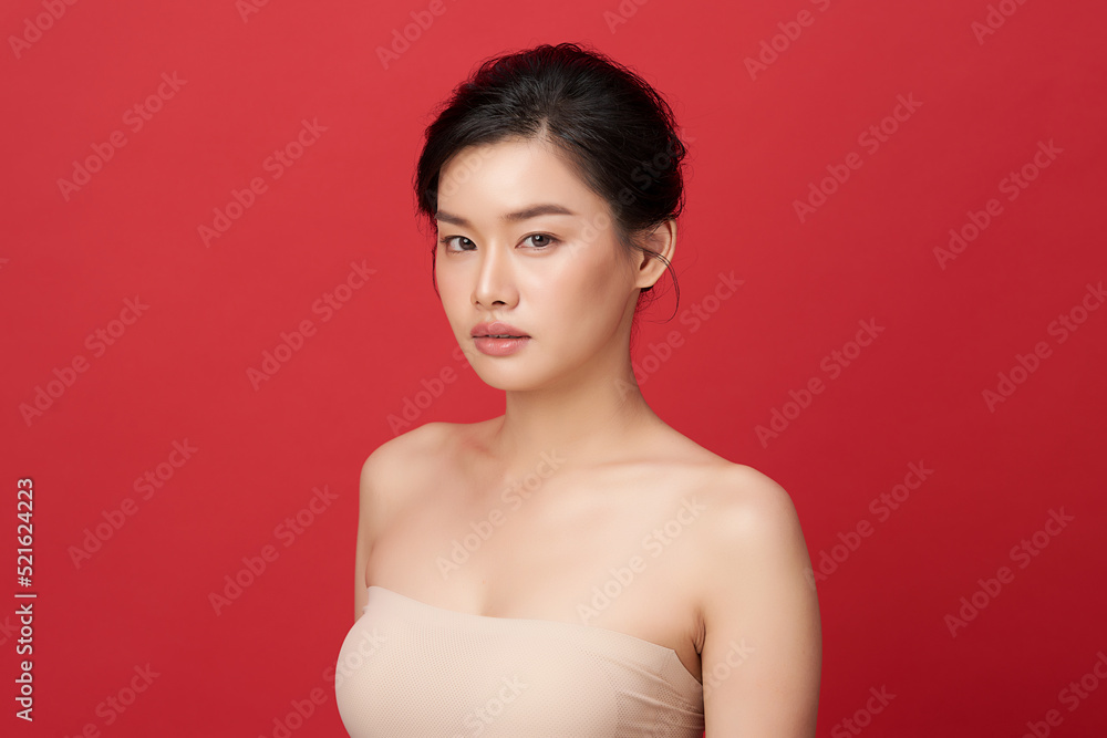 Beautiful young asian woman with clean fresh skin on red background, Face care, Facial treatment, Cosmetology, beauty and spa, Asian women portrait. Beautiful young asian woman with clean fresh skin on red background, Face care, Facial treatment, Cosmetology, beauty and spa, Asian women portrait.
