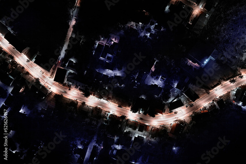 Birds eye view of main road at night time at the Banrak region of Koh Samui island in Thailand -aerial drone scene