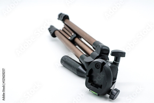 tripod for photo or video camera on white background