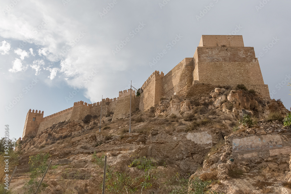 Panoramic full and main view at the exterior facade at the Alcazaba of Almería, Alcazaba y Murallas del Cerro de San Cristóbal, fortified complex in Almería, Spain