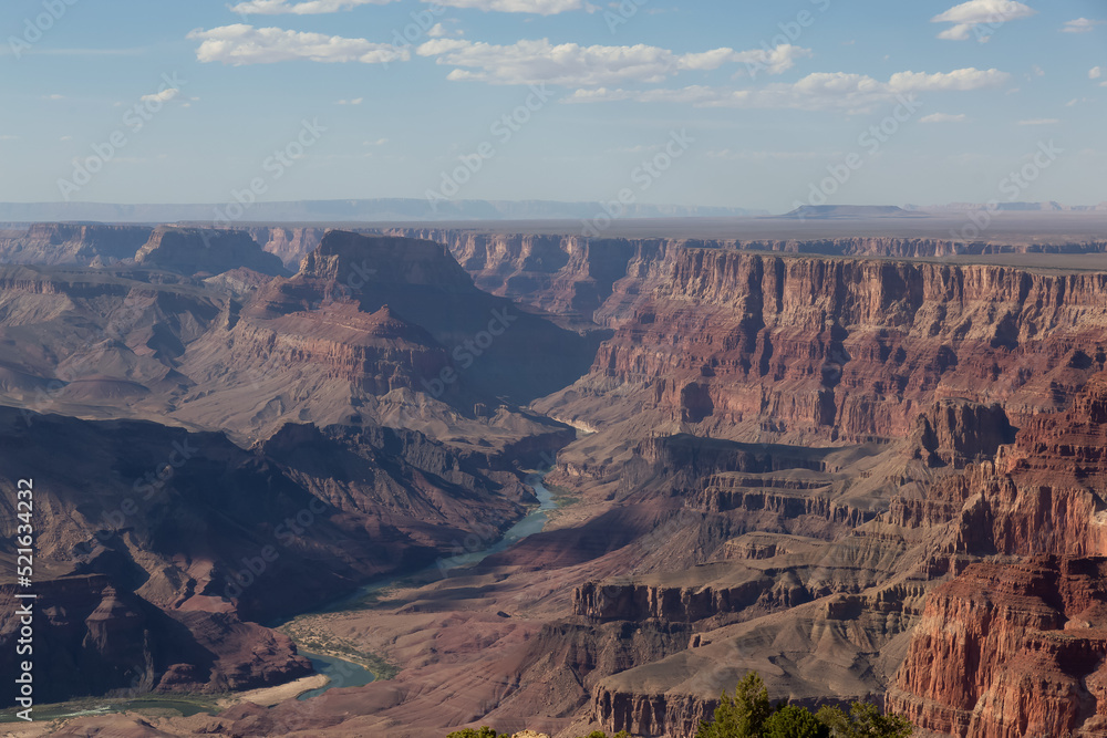 Desert Rocky Mountain American Landscape. Cloudy Sunny Sky. Grand Canyon National Park, Arizona, United States. Nature Background Desert Rocky Mountain American Landscape. Cloudy Sunny Sky. Grand Canyon National Park, Arizona, United States. Nature Background