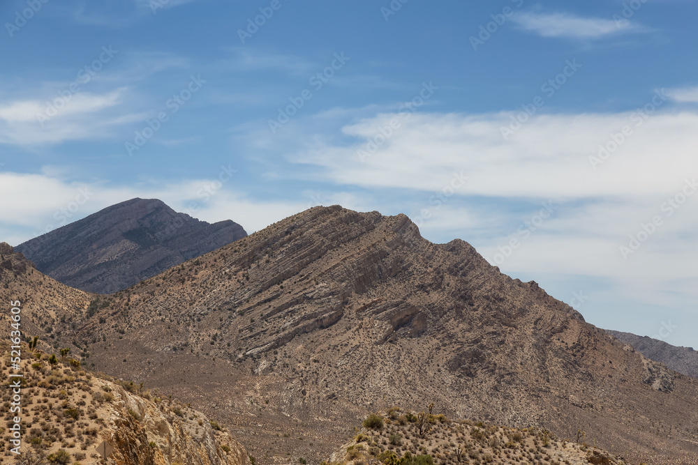 American Mountain Landscape in the desert. Sunny Cloudy Sky. Nevada, United States of America. Nature Background