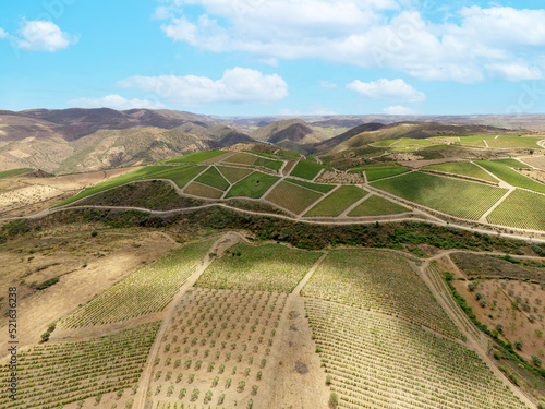 Aerial view of agricultural fields on hilltop in Castelo Melhor, Guarda, Portugal.