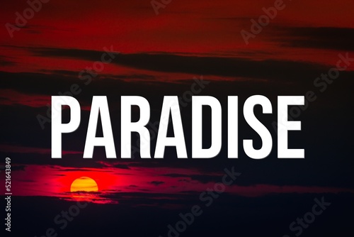 PARADISE - word on the background of the sky with clouds. © Ilya
