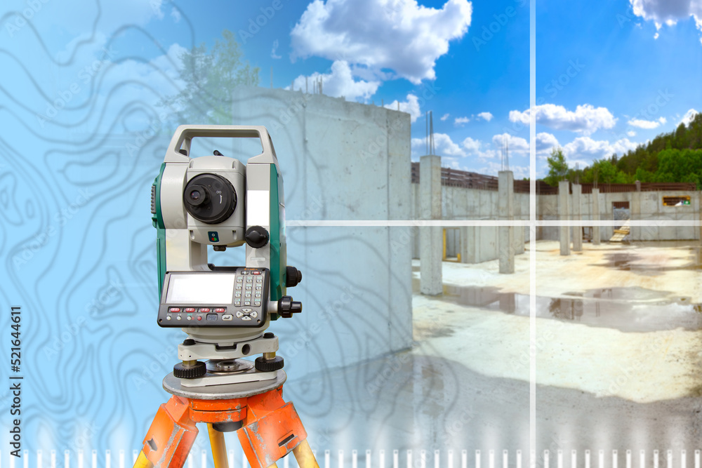 Geodetic electronic device. Optical level at construction site. Equipment for surveyor on tripod. Geodetic equipment is aimed at walls and columns. Geodetic inspection during construction. Art focus