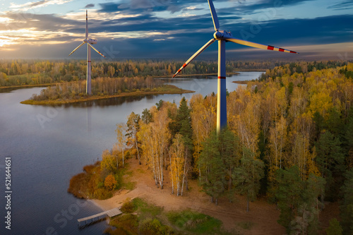 Windmills over forest. Huge...