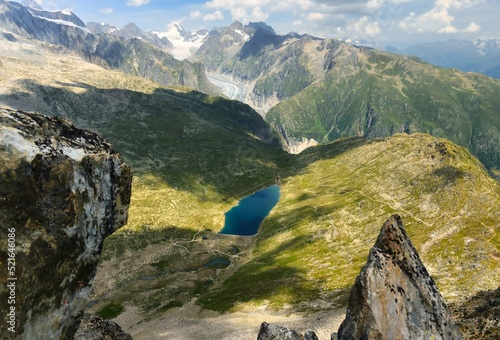 Aerial view of an alpine lake from Mt Eggishorn, Valais, Switzerland photo