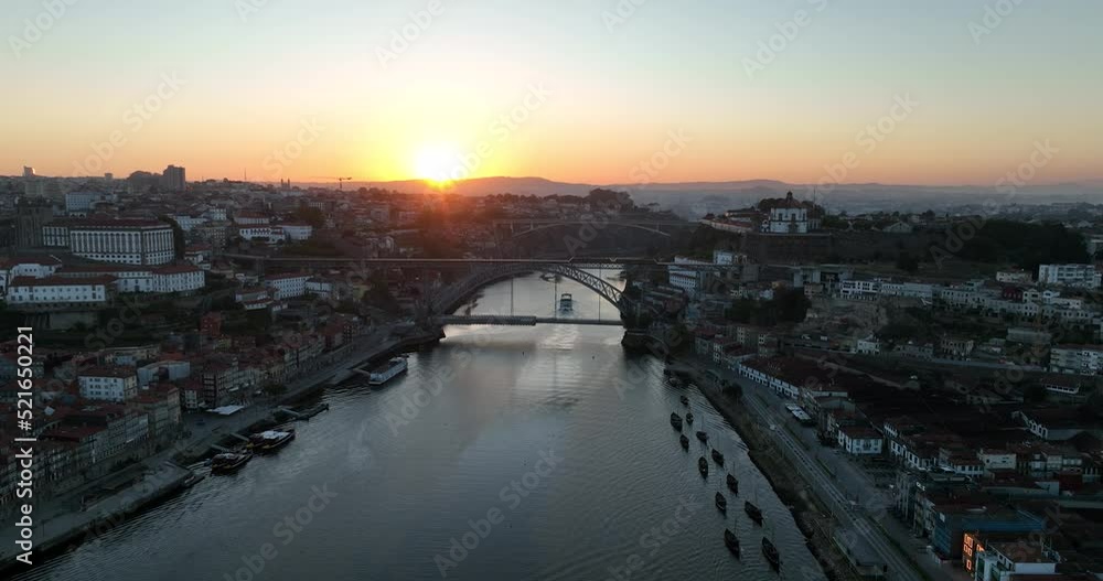 Porto Portugal Aerial View. Dom Luis Bridge at Sunrise. Porto, Portugal. Cityscape of Downtown Touristic Ribeira. Olt Town. Douro River. Porto Portugal Aerial View. Dom Luis Bridge at Sunrise. Porto, Portugal. Cityscape of Downtown Touristic Ribeira. Olt Town. Douro River.