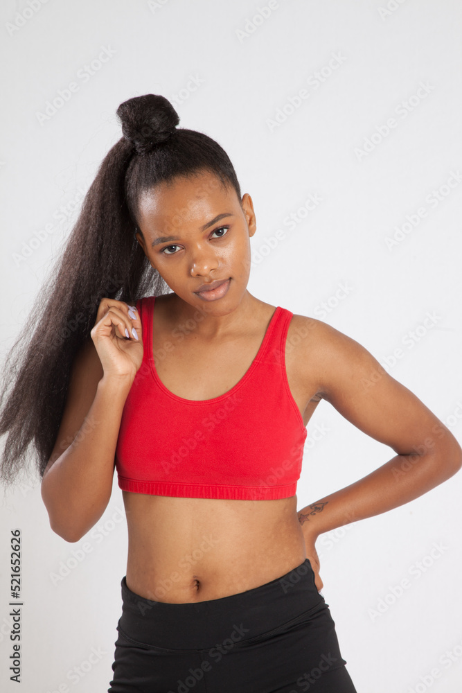 Pretty woman in an exercise outfit Pretty woman in an exercise outfit