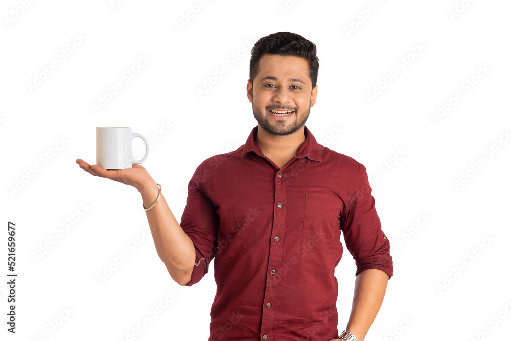Handsome smiling man with cup of coffee or tea isolated on white background Handsome smiling man with cup of coffee or tea isolated on white background