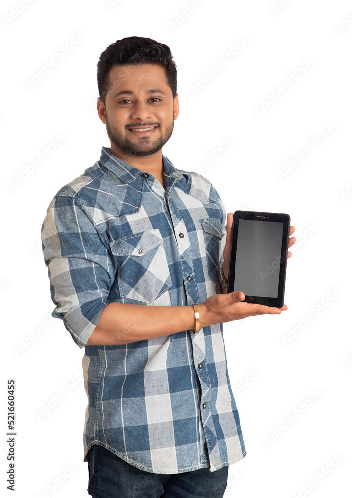 Young handsome man, businessman showing a blank screen of a smartphone or mobile or tablet phone on white background