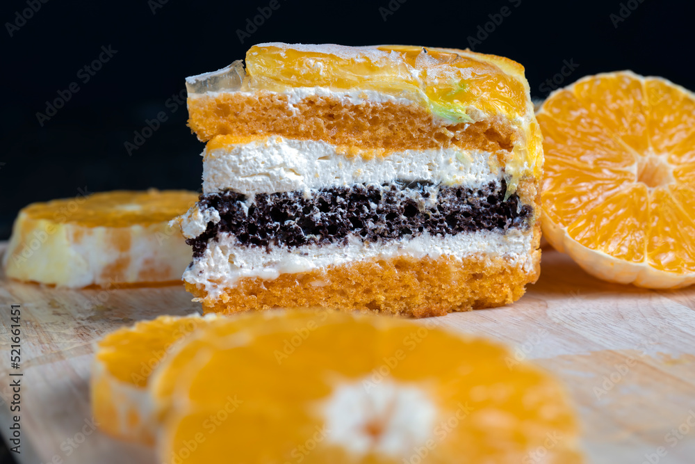 sliced fresh oranges and a piece of orange dessert sliced fresh oranges and a piece of orange dessert