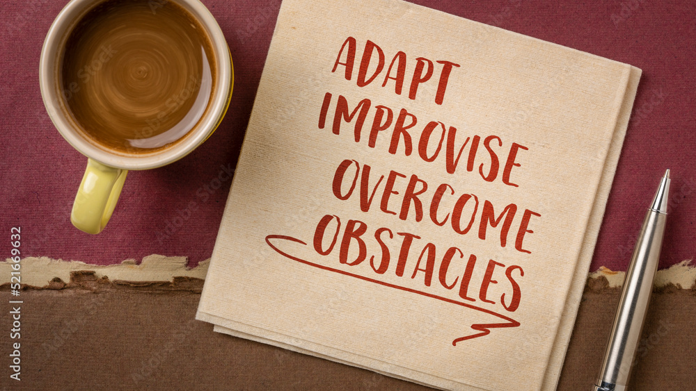 adapt, improvise, overcome obstacles - motivational note or advice on a  napkin, challenge and personal development concept Photos | Adobe Stock