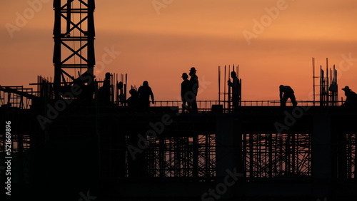 Silhouette of construction team working