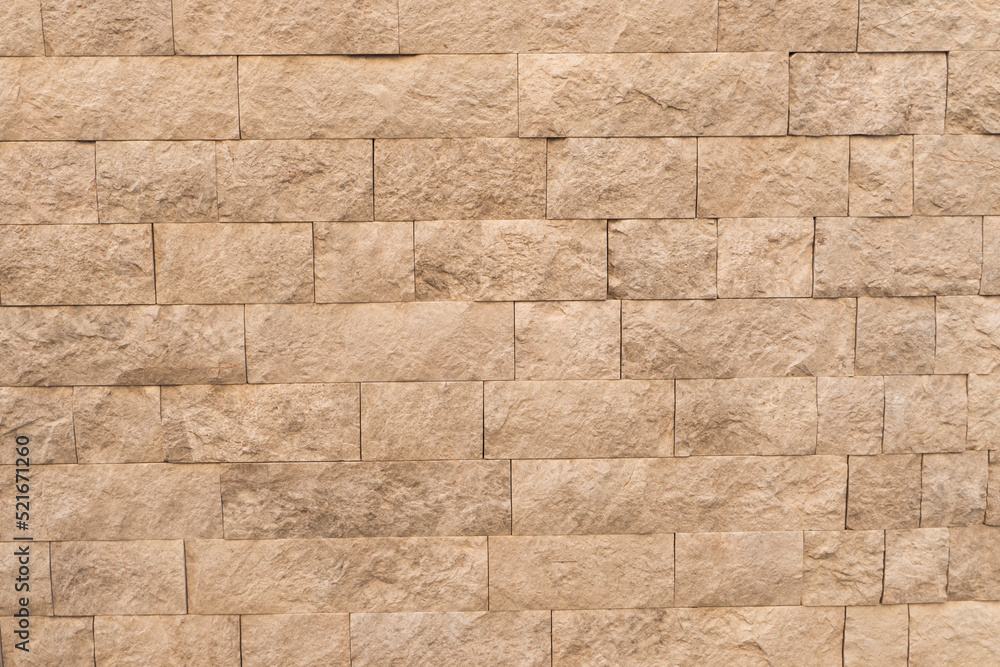 texture of beige stone wall with large stones texture of beige stone wall with large stones