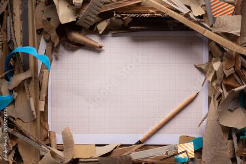 Waste paper as background texture. Recycled concept and brown cardboard heap