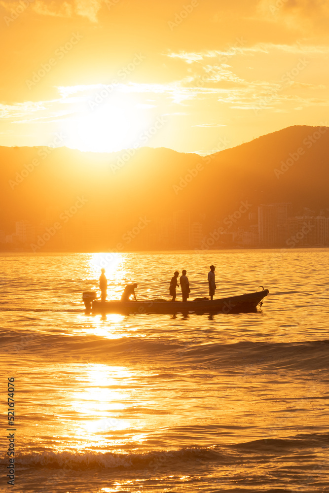 Fishermen at dawn, Acapulco Bay, Mexico