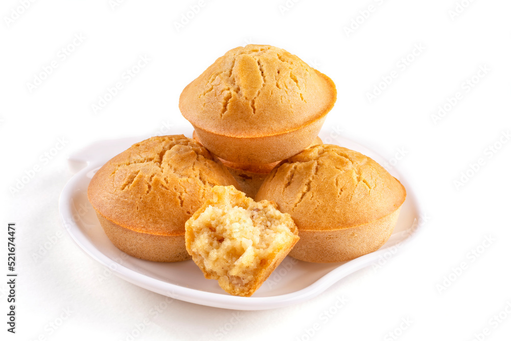 Homemade rice cupcakes with raisins on a saucer on a white isolated background. Rice flour muffins. Template for the design. The concept of proper nutrition, a gluten-free diet.