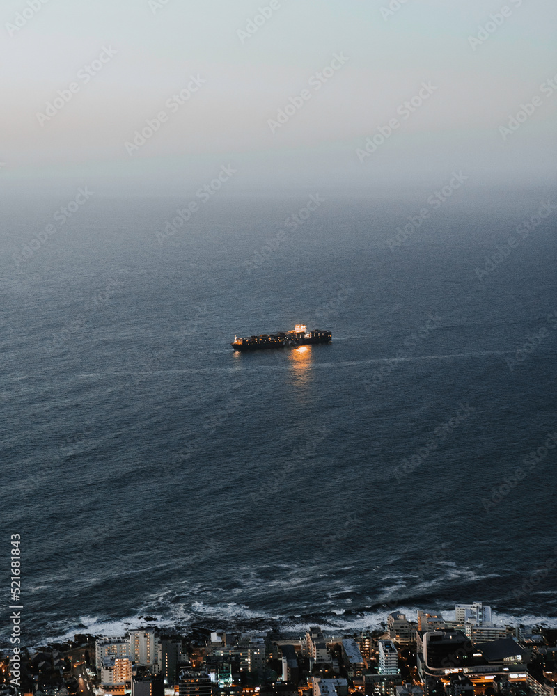 Cargo ship in the evening on he sea Cargo ship in the evening on he sea