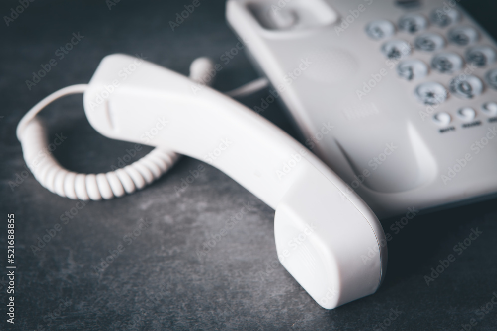 white home phone on the table white home phone on the table