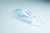 medical disposable mask on a blue background