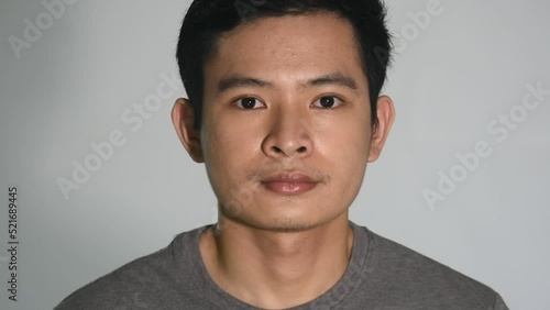 Serious Asian Filipino Man Closeup Isolated photo