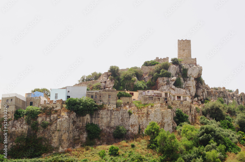 Sardinian village of Posada with the Castello della Fava tower. Sardinia, Italy