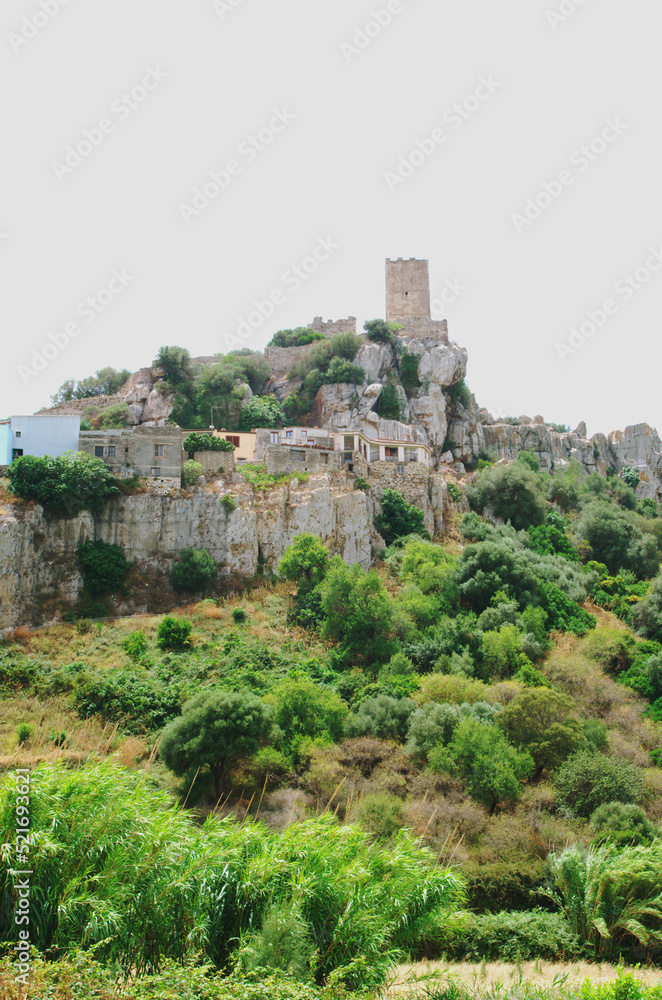 Sardinian village of Posada with the Castello della Fava tower. Sardinia, Italy
