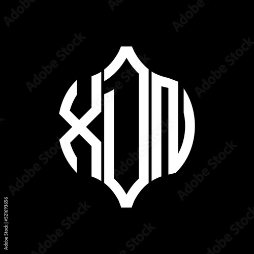 XDN letter logo. XDN best black background vector image. XDN Monogram logo design for entrepreneur and business.
 photo