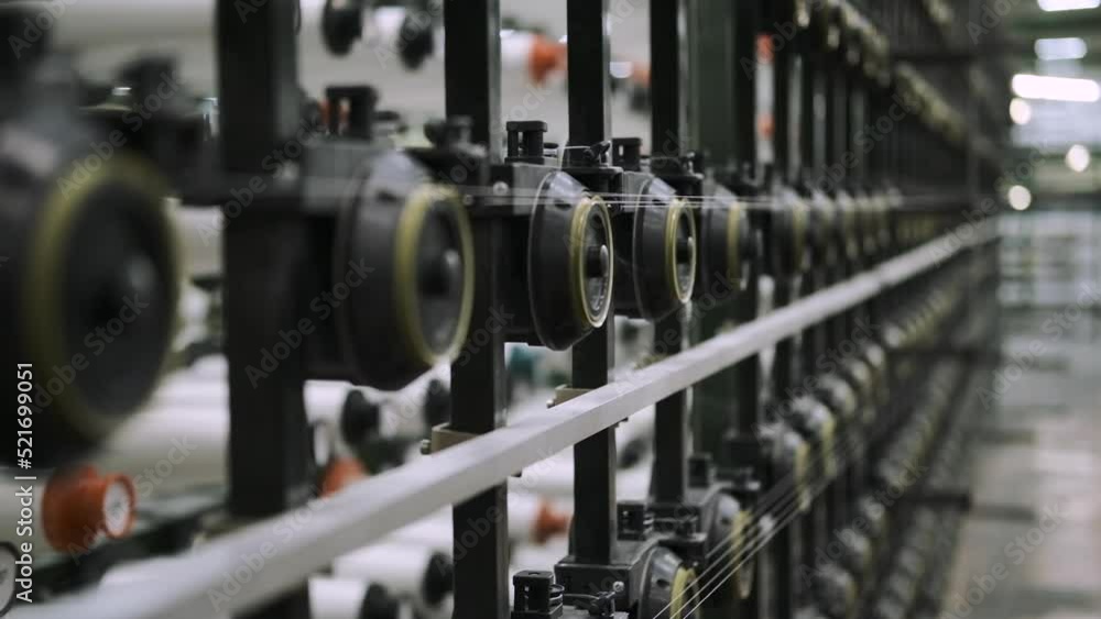 mechanization shop. industrial workshop in which the automatic production of fiberglass threads. fiberglass production. factory. industrial shop. automation mechanization shop. industrial workshop in which the automatic production of fiberglass threads. fiberglass production. factory. industrial shop. automation