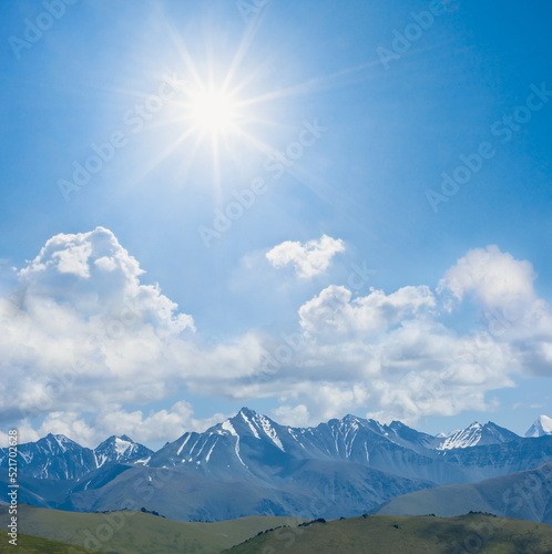 mountain chain in snow at hot sunny day, natural mountain travel background