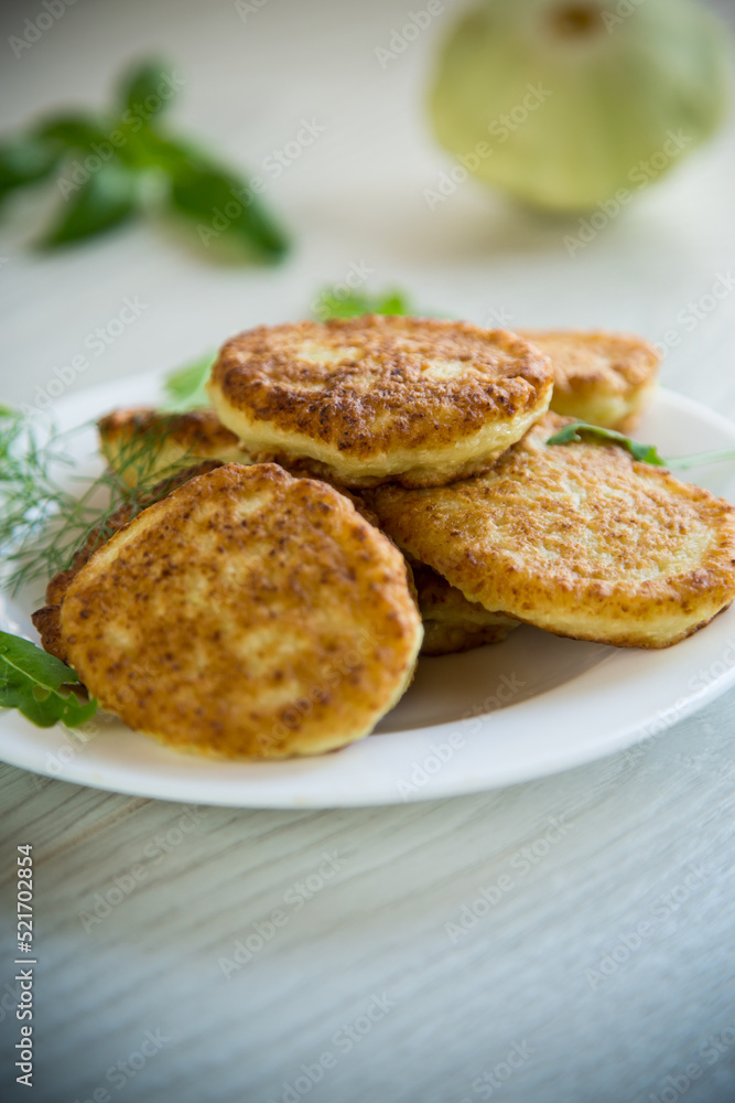fried vegetable pancakes from squash and zucchini with herbs