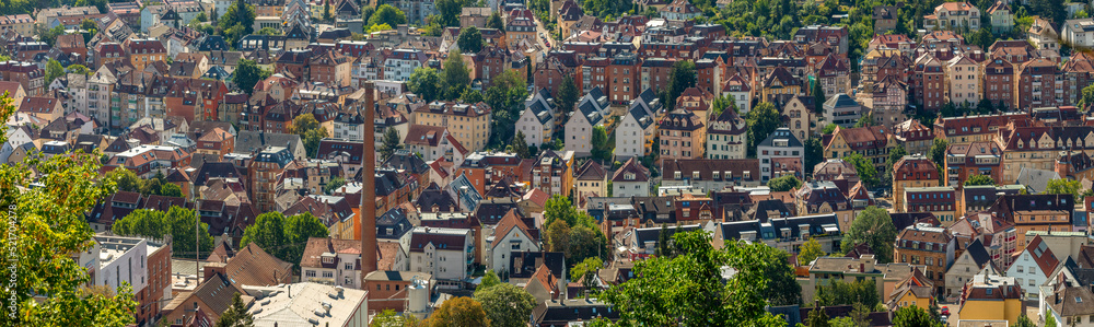 Panorama of Stuttgart Süd, Germany, Wide view over houses, roofs and buildings on a sunny summer day Panorama of Stuttgart Süd, Germany, Wide view over houses, roofs and buildings on a sunny summer day