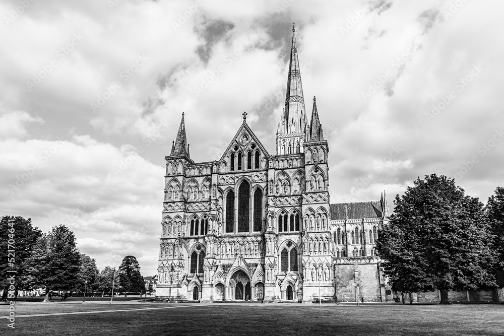 Facade of thegothic cathedral of Salisbury, Wiltshire, England, UK in black and white