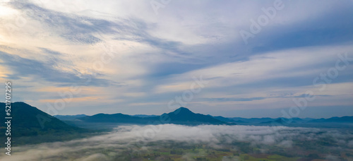 The natural scenery of sky and mountain sunlight fog . Aerial photos of beautiful thailand countryside scenery. thai main food production area. 