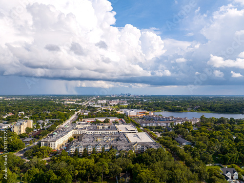 Aerial view of Maitland Florida with downtown Orlando in the distance with rain showers. June 27, 2022 photo