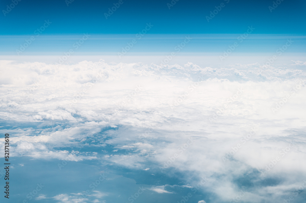 beautiful blue sky with white clouds heaven horizon over the planet earth world, view from the airplane or satellite. atmosphere or stratosphere space layer. astronomy and geology sciense nature beautiful blue sky with white clouds heaven horizon over the planet earth world, view from the airplane or satellite. atmosphere or stratosphere space layer. astronomy and geology sciense nature