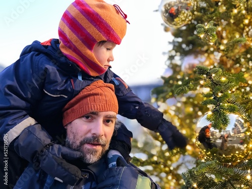 Wallpaper Mural Father and son spend time together at the Christmas tree Torontodigital.ca