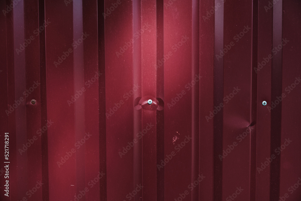 Fototapeta premium An old dirty and rusty sheet of corrugated iron Industrial background The texture of a crumpled aluminum fence