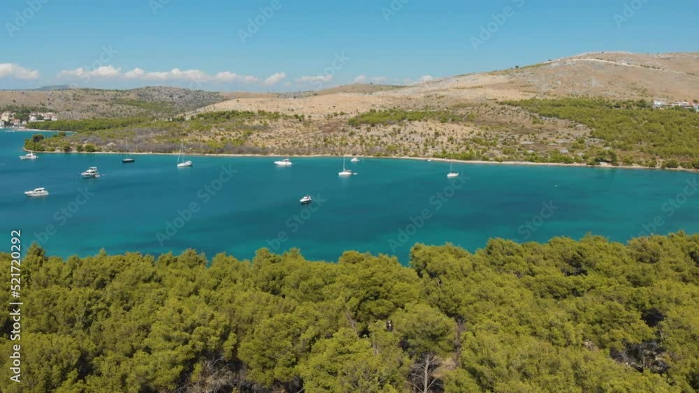 Croatia. Bay with yachts on the Adriatic coast. Summer. Tourist season. Popular place to relaxation. Drone. Aerial view. The camera moves from right to left Croatia. Bay with yachts on the Adriatic coast. Summer. Tourist season. Popular place to relaxation. Drone. Aerial view. The camera moves from right to left