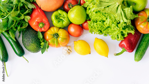 Delivery healthy food background. Healthy vegan vegetarian food in  vegetables and fruits on white  copy space  banner. Shopping food supermarket and clean vegan eating concept.